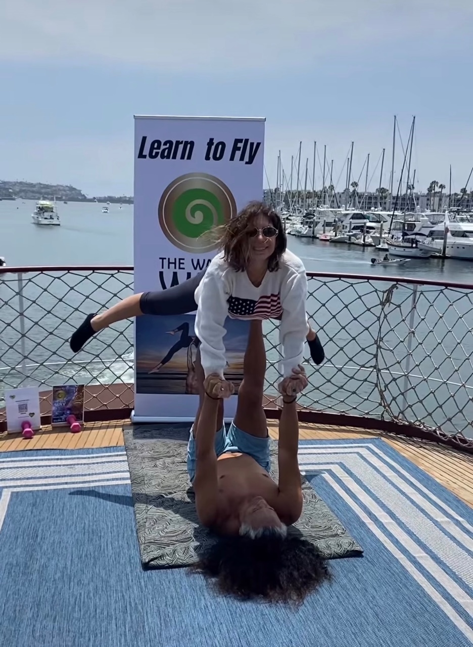 Acro yoga activity on the yacht deck